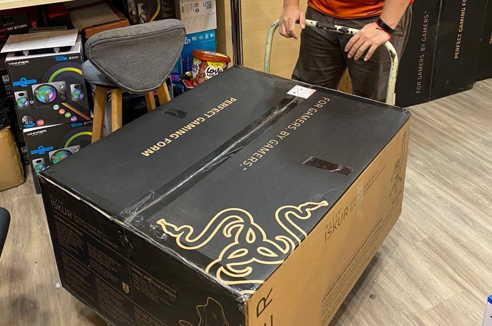 view of razer iskur gaming chair unboxing purchased package arrival at home