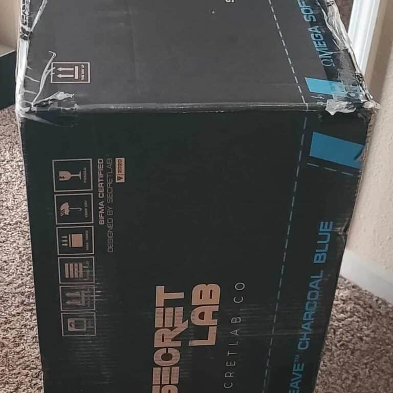view of secret lab gaming chair unboxing purchased package arrival at home