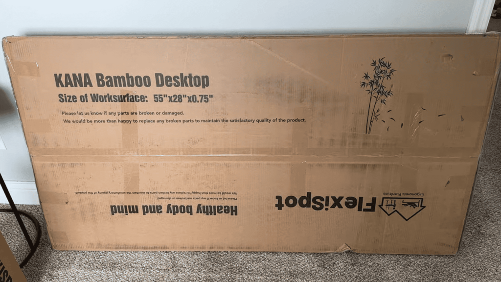 view of view of flexispot e7 pro plus top board standing desk unboxing purchased package arrival home 1