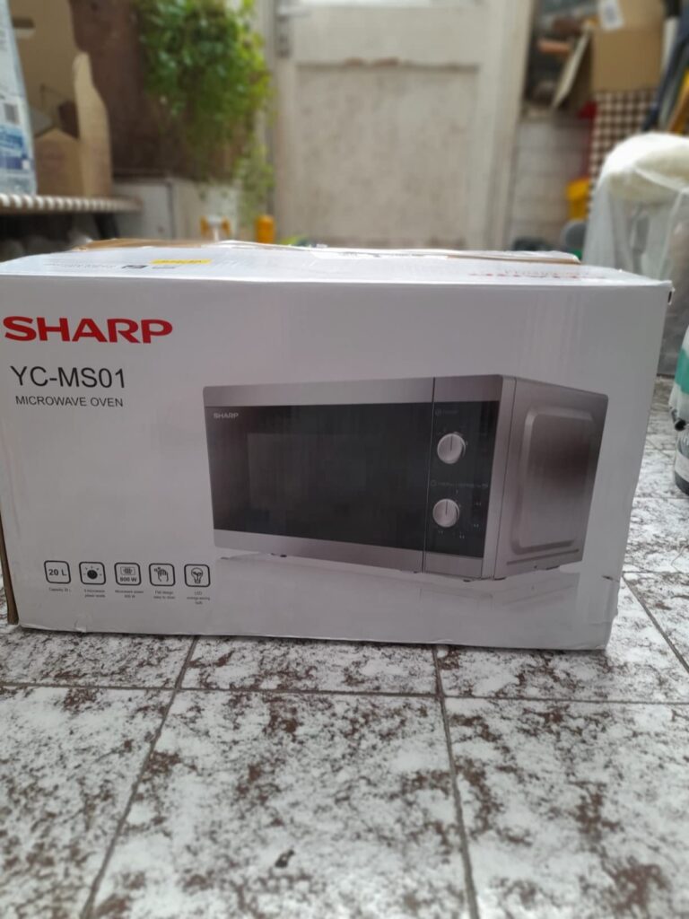 view of sharp microwave under 100 unboxing purchased package arrival at home testing experience 