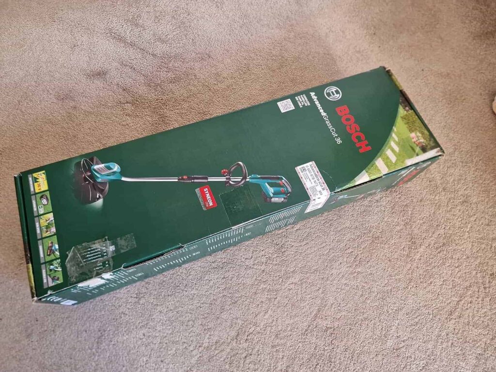view of bosch heavy duty cordless strimmer uk unboxing purchased package arrival at home testing experience 