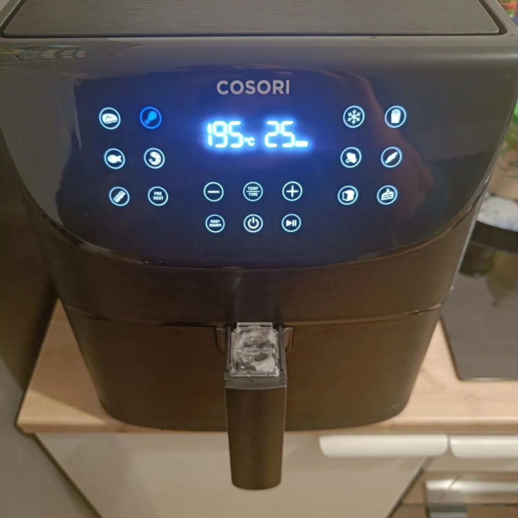 view of cosori air fryer with stainless steel basket tried and tested for several week unboxing purchased package arrival at home testing experience