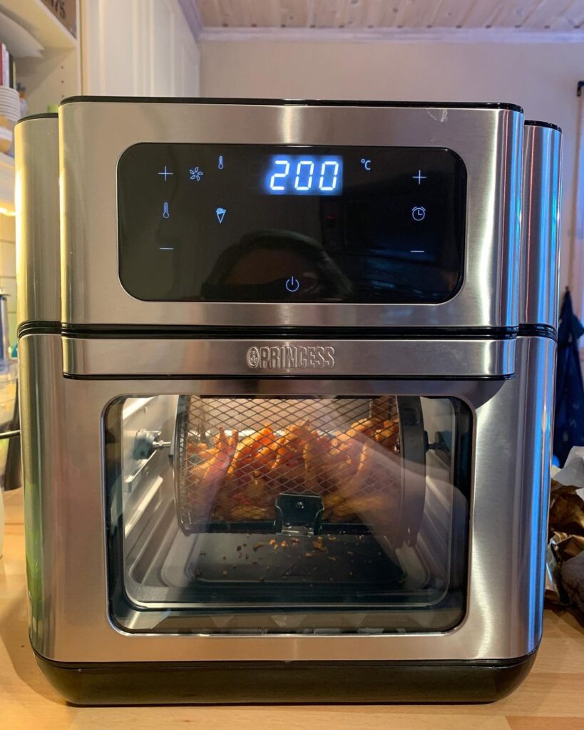 view of princess air fryer with stainless steel basket tried and tested for several week unboxing purchased package arrival at home testing experience